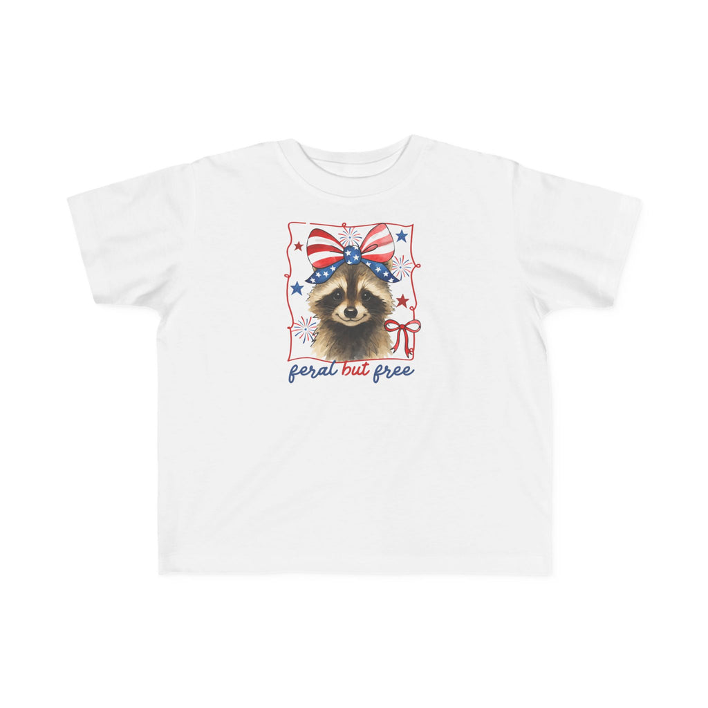 Toddler Tee — "Feral But Free" Raccoon with American Flag Bow (Patriotic 4th of July Kids Shirt)